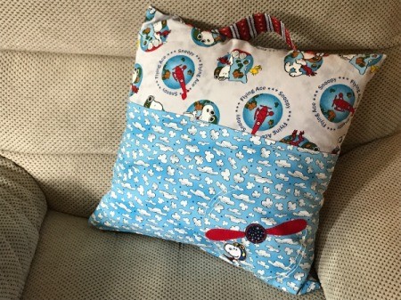 Book Pocket Pillow - finished pillow on chair