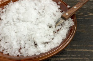 A plate of epsom salts and a spoon.