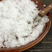 A plate of epsom salts and a spoon.
