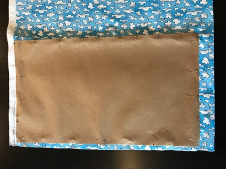 Book Pocket Pillow - pocket pattern pinned to cloud fabric