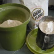 Sift Flour into Canister - avocado green canister and sifter