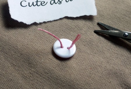 New Baby Greetings Card - thread through the button holes