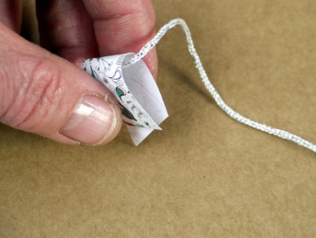 Bunting Greetings Card - fold a bit of tape over the end of the cord and stick it to itself