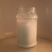 A jar of frothed milk.
