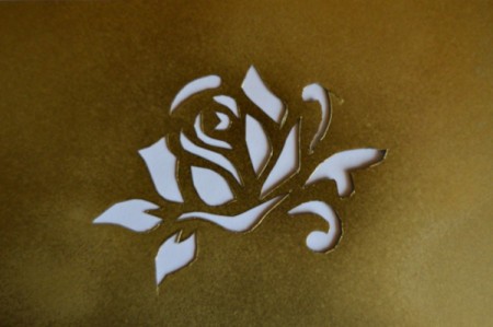 Mother's Day Table Decoration - Spray the top of the piece of X-ray film with the green gold spray paint and allow to dry thoroughly.