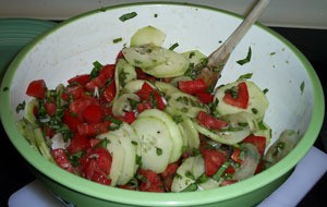 Basil Tomato Salad with Grilled Chicken - mixing ingredients