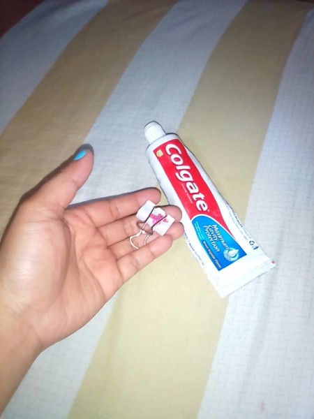 Using a binder clip for your toothpaste.