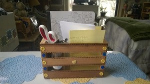 Embellishing a Wooden Crate as a Recipe Box - paper, scissors, and other supplies in crate