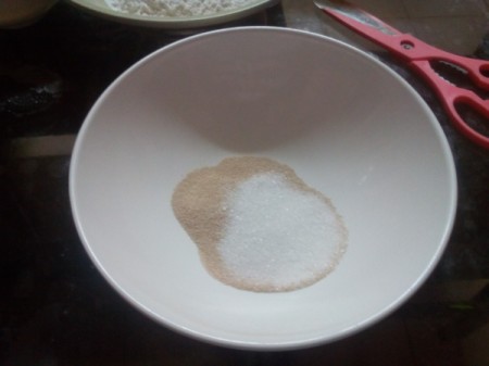 sugar and yeast in bowl