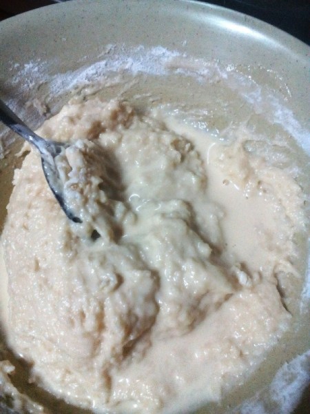 mixing dough in bowl