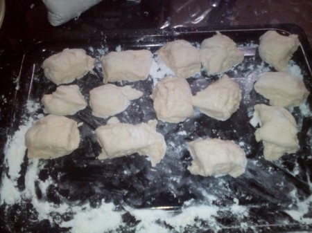 cut bread dough on pan