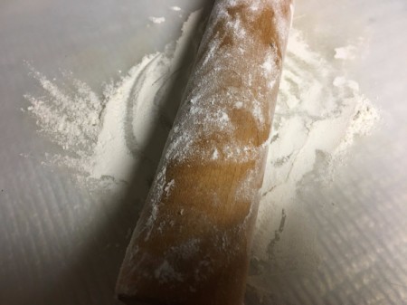 rolling pin and flour on mat
