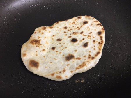 flatbread flipped in pan