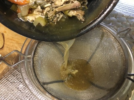 straining Chicken Stock