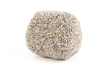 A round pumice stone, to be used for cleaning.