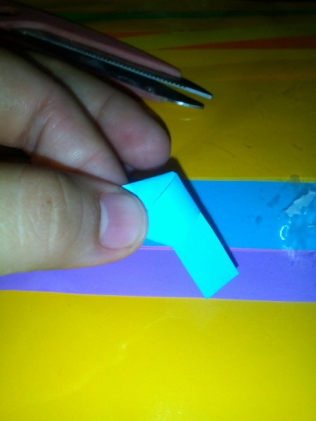 Folded Paper Stars in a Jar - completed knot