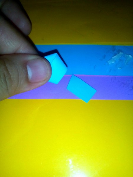 Folded Paper Stars in a Jar - cut off excess small tip