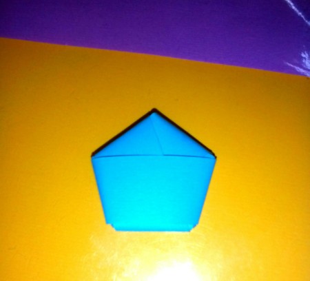 Folded Paper Stars in a Jar - tuck end into nearest pocket, pentagon formed