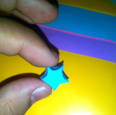 Folded Paper Stars in a Jar - it will pop up into a 3D star