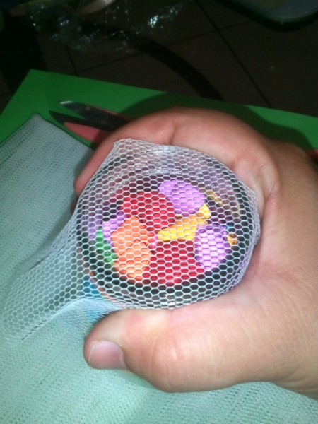 Folded Paper Stars in a Jar - cover jar with a piece of fancy cloth and seal with ribbons