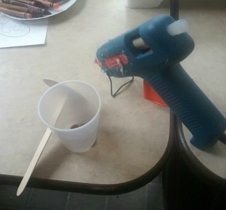 Handmade Maracas for Children - put glue around the rim of cup