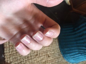 Fingernails with a natural manicure.