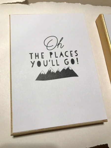 How to Mod Podge Cardstock to Canvas - brush mod podge onto the canvas where the cardstock will be, center image and press down