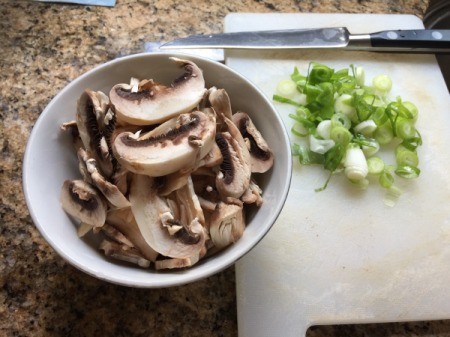 sliced mushrooms, and chopped green onions