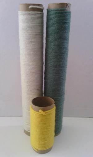 Paper Towel Rolls as Yarn Organizer - yarn wrapped around paper tubes