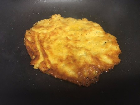 flipped melted cheese in pan