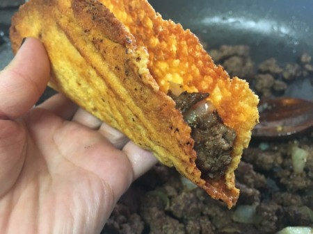 burger in cheese taco shell