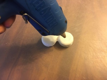 Contact Lens Case as Earbud Headphones Case - add a dot of glue to center of lid for decorative bead