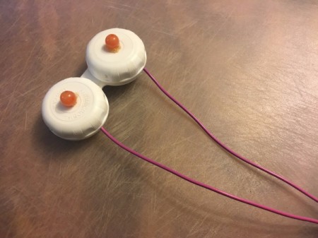 Contact Lens Case as Earbud Headphones Case - case with two beads attached