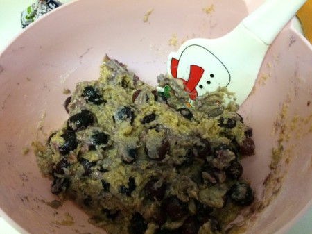 adding blueberries to batter
