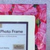 A decorative picture frame made with wrapping paper.