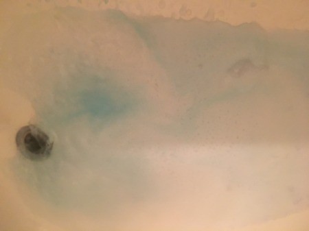 Hair dye in the bottom of a bathtub