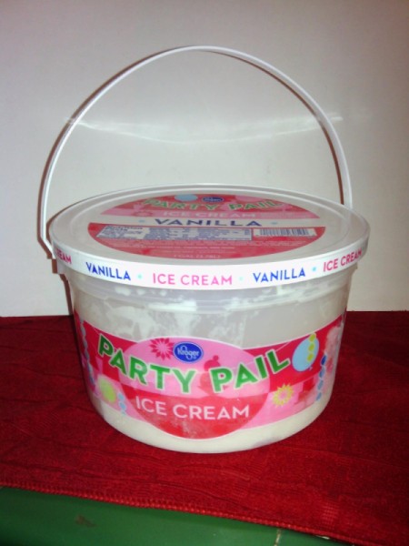 A plastic pail of ice cream.
