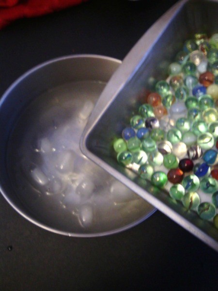 How to Make Crystallized Marbles - slowly pour marbles into the bowl of cold water
