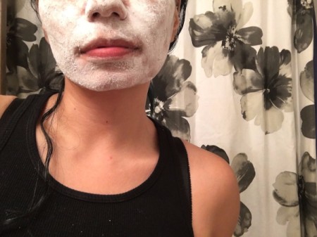 Baby powder all over a woman's face.