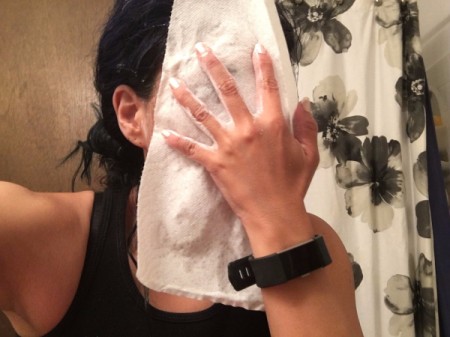 Drying face after ice water bath.