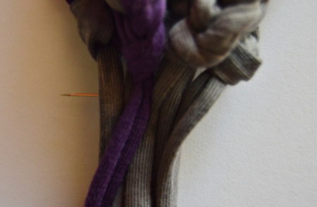 Modern T-shirt Yarn Necklace -  pin all 6 strings together below the slip knots at the start of each chain, then backstitch to neatly sew them together