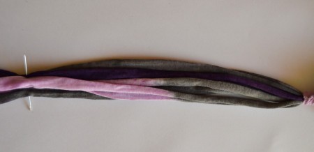 Modern T-shirt Yarn Necklace - gather the six strings together 10" lower down from the area where the short piece of string was wound