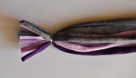 Modern T-shirt Yarn Necklace - and use a backstitch to sew them together. Neatly cut the ends behind the stitches shorter.