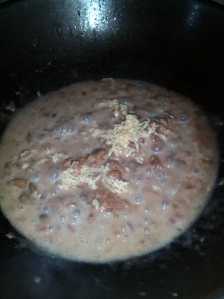 adding cheese to mixture