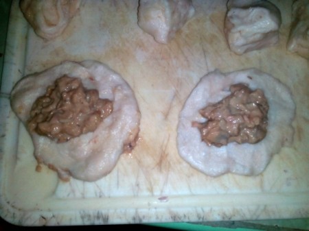 filing on pieces of pre-made dough