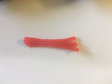 Graduation Cap Treats - cut Twizzlers in 3 lengthwise and separate ends a bit