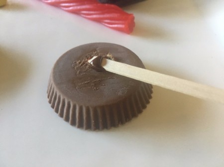 Graduation Cap Treats - turn peanut butter cup over and add a dab of melted chocolate