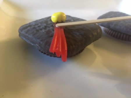 Graduation Cap Treats - use melted chocolate to attack the Twizzler tassel