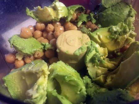 Avocado and garbanzo beans in food processor