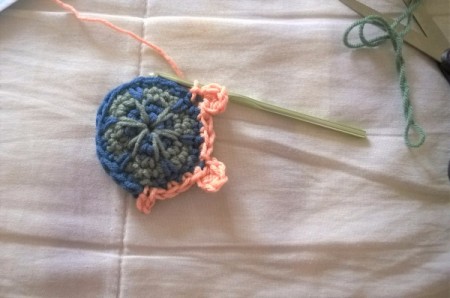 Crocheted Turtle - crocheting feet and working around to head